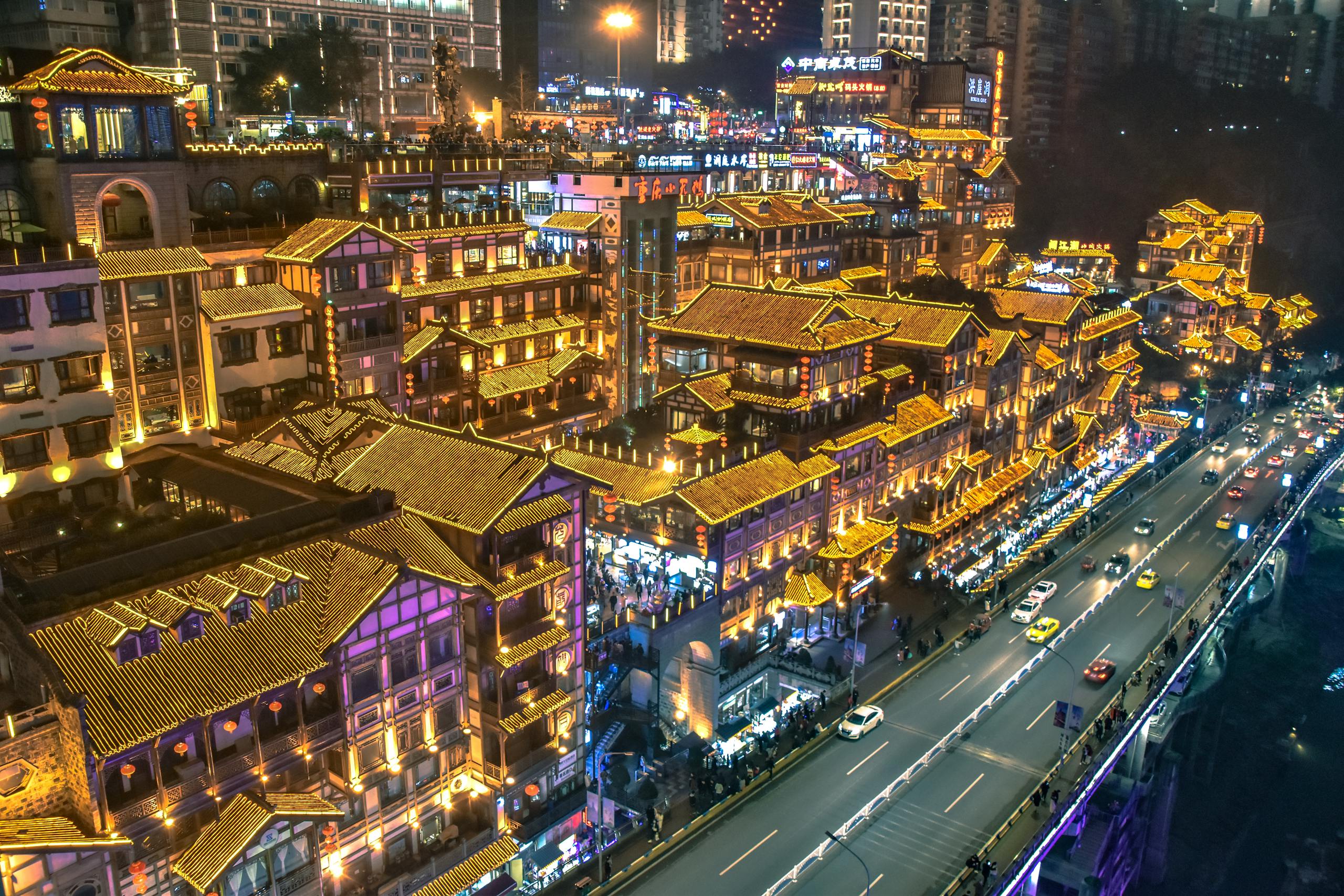 Stunning night view of illuminated traditional Chinese architecture in Chongqing