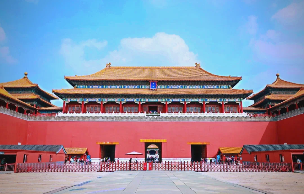 Tourists planning a trip to China visa free entering Forbidden City 2026.