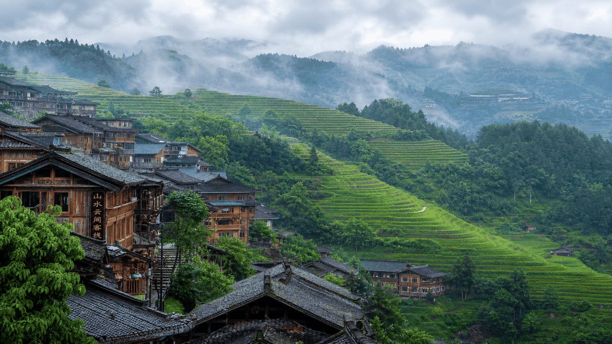 Guizhou highland villages and terraced hills in cool summer China travel scene